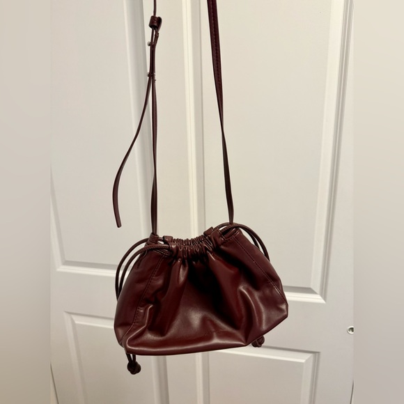 Calvin Klein Burgundy Cross Body Drawstring Bag - Picture 2 of 5